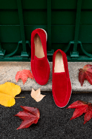 Red vegan velvet loafer by Solari Milano, worn outdoors, premium cruelty-free footwear