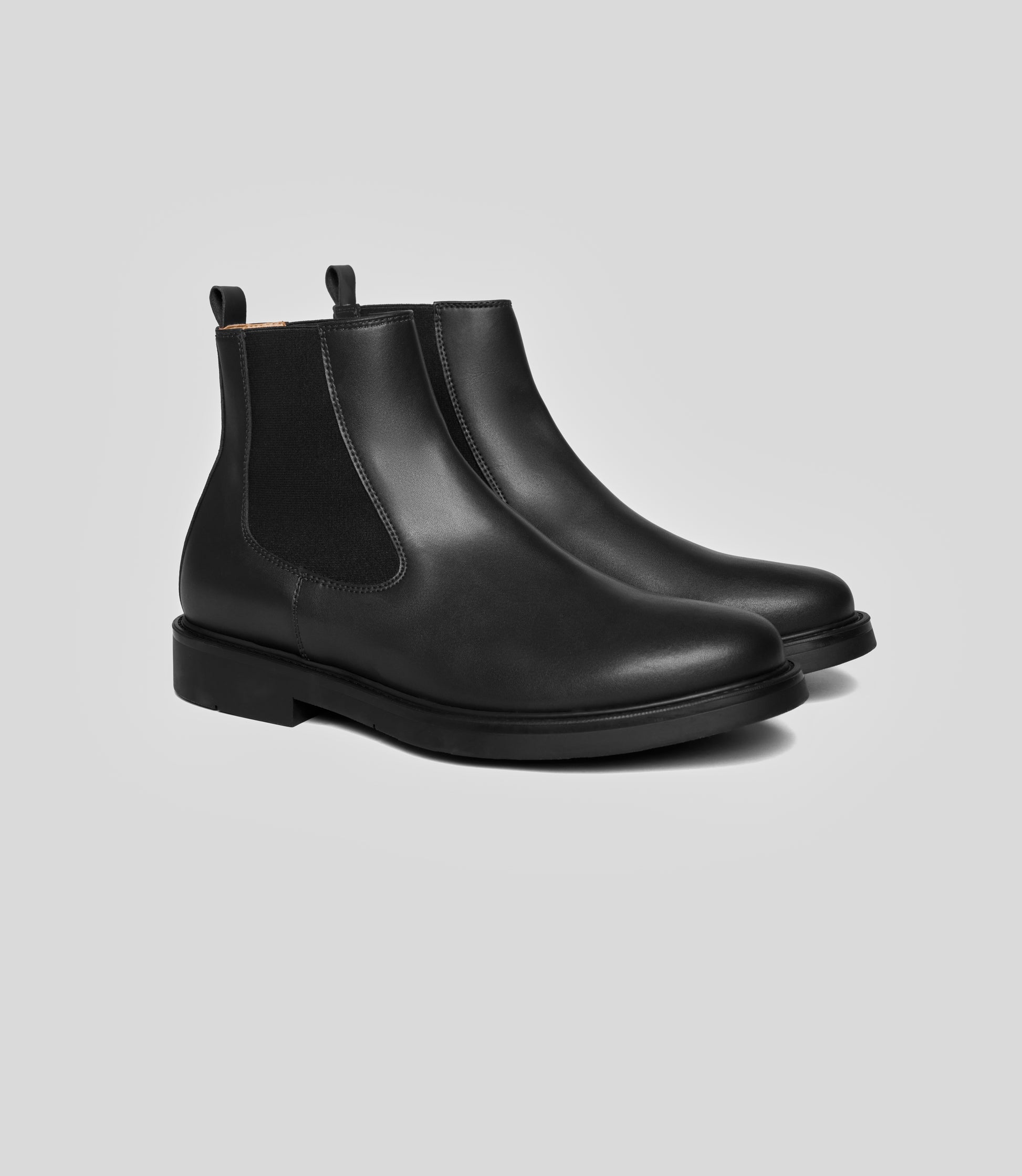 Vegan Chelsea Boot - Men, stylish black leather boots with elastic side panels for a sleek, elegant look.