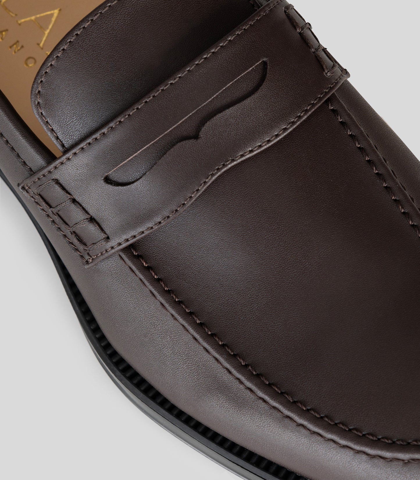 Close-up of the Vegan Loafer - Man showcasing the stylish design and U-shaped pattern on the upper.