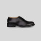Vegan Oxford - Woman classic black lace-up shoe side view with Blake Construction.