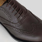 Close-up of Vegan Oxford Brogue - Woman featuring detailed broguing and lace-up design.