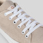 Close-up of Vegan Hemp Sneaker V1 featuring breathable hemp fabric and white laces.