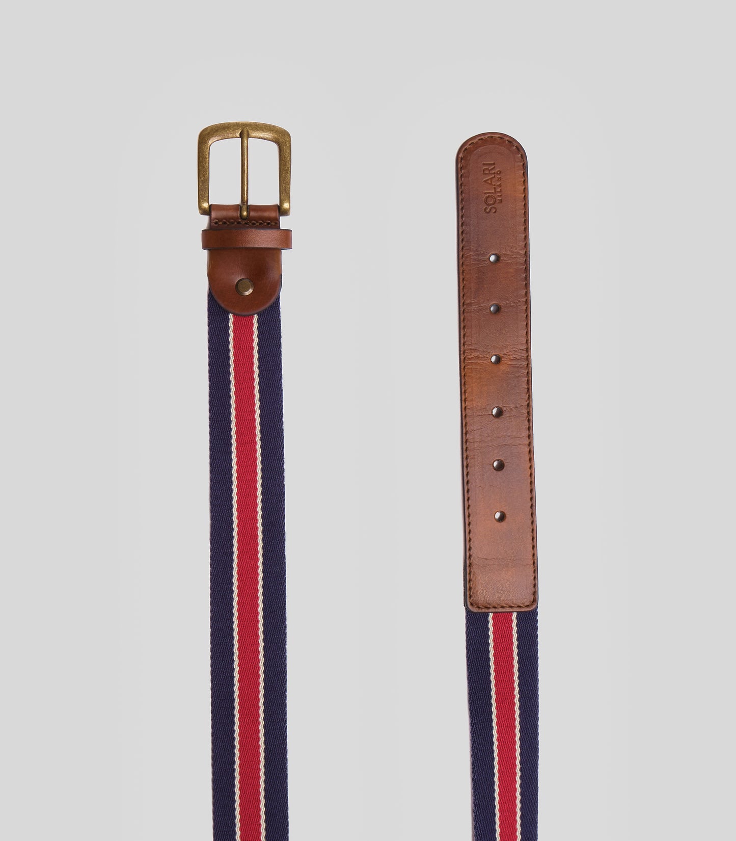Sustainable vegan belt Brera in white, blue and red made out of materials such has acrylic, vegan leather and a nickel-free buckle 100% handmade in Italy.