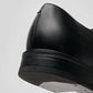 Close-up of the Vegan Monk Strap - Man shoe showcasing the back silhouette and black leather details.