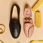 Premium cedar wood Shoe Trees placed beside a sleek black shoe and measuring tape on a beige background.