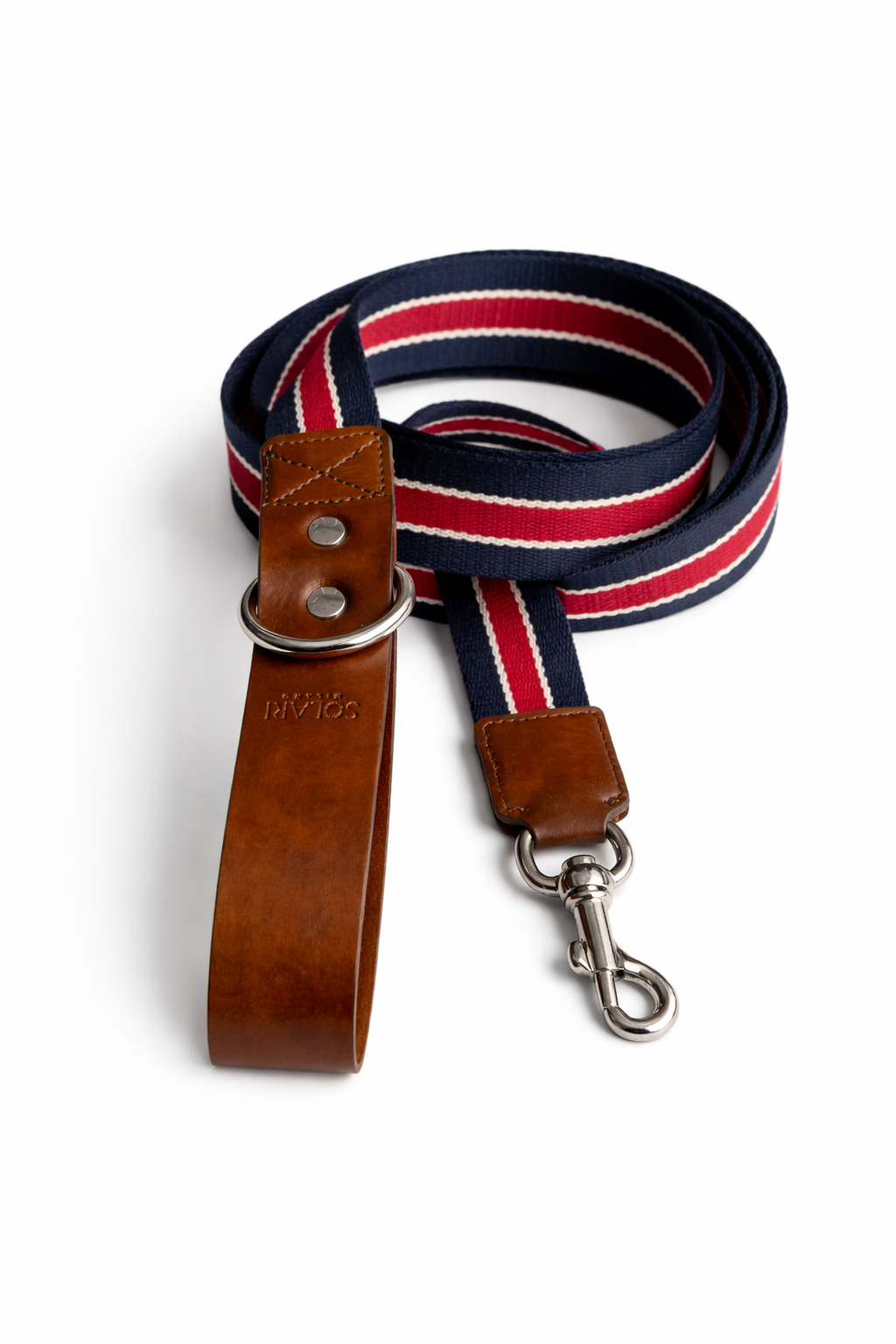 Vegan dog leash handmade featuring durable acrylic and refined vegan leather detail in navy and red colors.