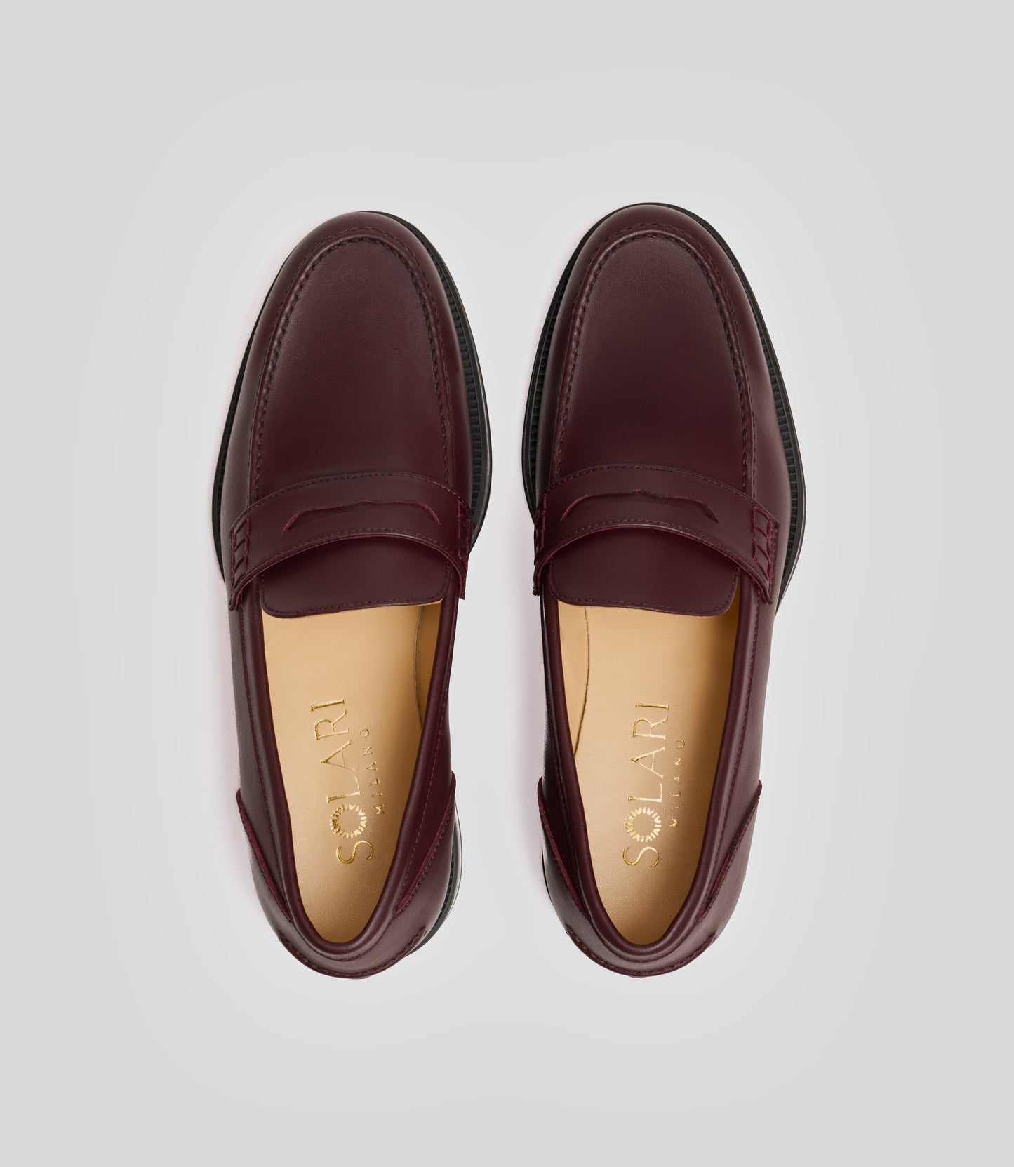 Vegan Loafer - Man from Solari Milano, featuring a classy maroon color and U-shaped stitched pattern.