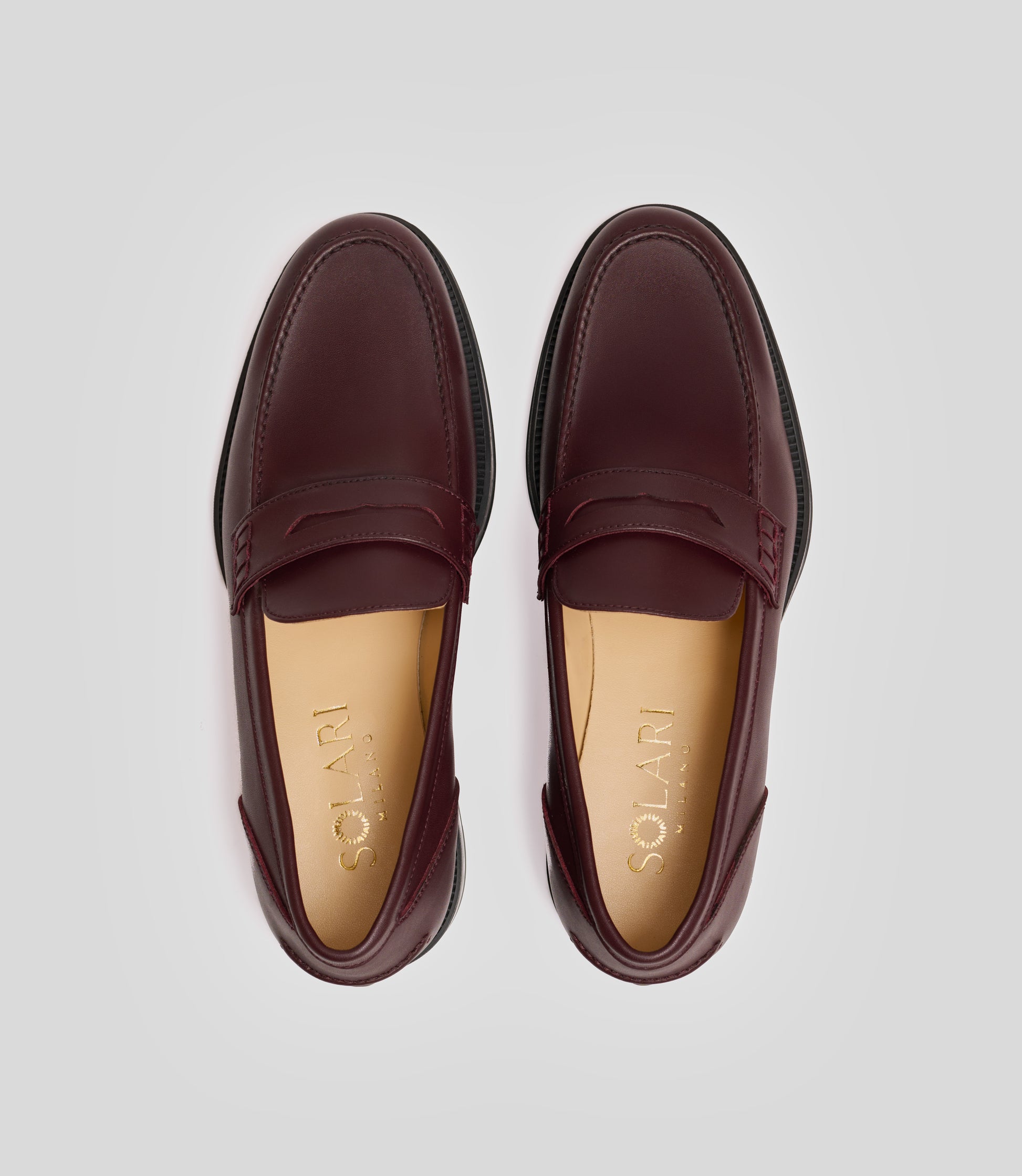 Vegan Loafer - Man from Solari Milano, featuring a classy maroon color and U-shaped stitched pattern.