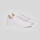 Vegan sneakers handmade in Italy, featuring a sleek white design, breathable materials, and handcrafted quality.